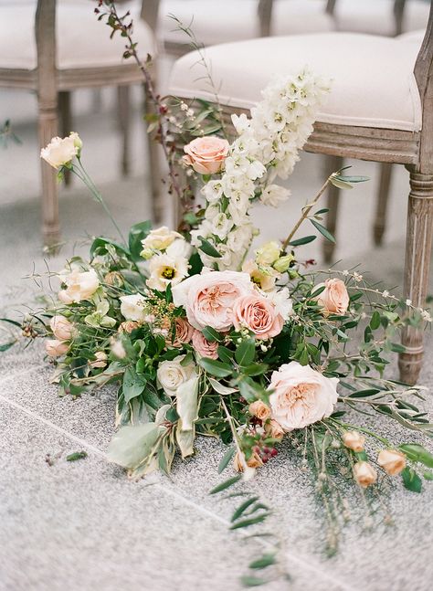 Ground Aisle Arrangements, Wedding Moss And Blush, Aisle Ground Arrangements, Grounded Florals, Mother Of The Bride Flowers, Aisle Florals, Peach Color Schemes, Aisle Ideas, Wedding Aisle Outdoor