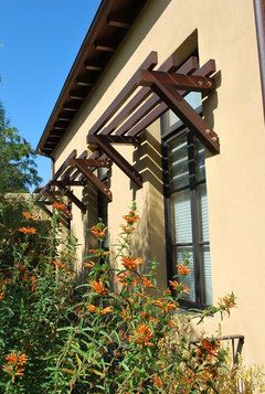 Great wood awning! Are they from a kit?Thanks Contemporary Shutters, Diy Window Trim, Diy Awning, Best Exterior Paint, Exterior Window, Rustic Exterior, Window Trim Exterior, Exterior Stairs, Rustic Window