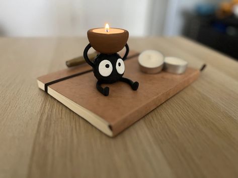 Susuwatari (Soot Sprite) Tea Candle Holder | AMS Friendly | Painted Version Included by Keebitzenny - MakerWorld Clay Soot Sprite, Tea Candle Holder, Clay Pen, Soot Sprite, Tea Candle Holders, Tea Candle, Soot Sprites, 3d Printing Projects, Japanese Film