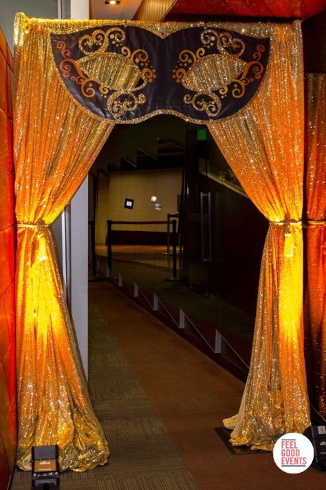 Masquerade Party Setup, Blue And Gold Masquerade Party Decorations, Big Masquerade Mask Decoration, Red Carpet Masquerade Party, Masquerade School Dance Decorations, Carnival Masquerade Party, Masquerade Entrance Decor, Masquerade Theme Decorations, Masquerade Party Decorations Theme Entrance