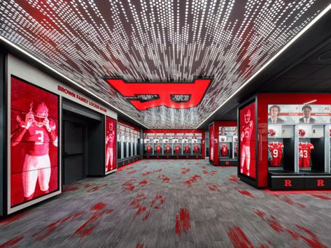 Rutgers University Football Locker Room - Natoli ConstructionNatoli Construction Perforated Metal Ceiling, Perforated Ceiling, Athletic Locker, Team Huddle, Rutgers Football, Experiential Graphic Design, Water Feature Wall, Bubble Wall, Rutgers University