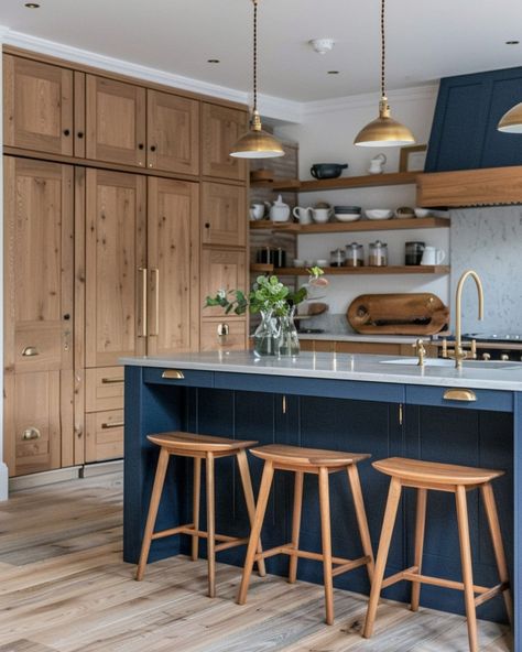 Absolutely swooning over all these dark blue and oak kitchen designs. Using dark blue and oak cabinets in the kitchen creates a striking balance between modern sophistication and natural warmth. The deep, rich tones of dark blue add depth and elegance, while oak introduces a natural, organic element that softens the overall look. This combination works because it blends contemporary style with timeless materials, creating a kitchen space that feels both chic and inviting. The contrast bet... Blue And Oak Kitchen, Textured Kitchen, Addition Project, Dark Blue Kitchens, Island Table, Kitchen Island Table, Oak Kitchen Cabinets, Dark Kitchen, Box Houses