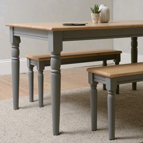 For a touch of sophisticated farmhouse charm in smaller kitchens, the Farmhouse Storm Grey Table could be just what you are looking for. Seating four comfortably, it could seat six at a pinch, especially if they were closely acquainted. With a scrubbed pine top and contrasting, grey painted, turned legs, this solid pine table is perfect for family gatherings and dinner parties with friends. We've teamed it here with 2 of the matching Painswick Storm Grey Dining Benches. Dining Room Paint Ideas, Bench Dining Room Table, Grey Kitchen Table, Emerald Green Living Room, Sophisticated Farmhouse, Farmhouse Dining Benches, Elegant Living Room Furniture, Room Paint Ideas, Upholstered Dining Bench