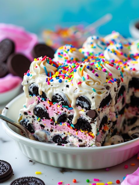 🎉No-Bake Funfetti Oreo Icebox Cake 🎉  🎉Ingredients🎉 - 1 package (14.3 oz) Oreo cookies - 1 cup heavy cream - 1 cup powdered sugar - 8 oz cream cheese, softened - 1 teaspoon vanilla extract - 1/2 cup rainbow sprinkles - 1/2 cup mini chocolate chips (optional) 🎉Instructions🎉 1. In a large bowl, whip the heavy cream and powdered sugar until stiff peaks form. 2. In another bowl, beat the softened cream cheese until smooth. Mix in the vanilla extract. Oreo Thins Dessert, Crumbl Cookie Copycat Oreo Birthday Cake, Oreo Cookie Dough Ice Cream Cake, Funfetti Oreo, Fudge Swirled Oreo Bottom Cheesecake, Oreo Icebox Cake, Cookies & Cream Cheesecake Deep-fried Oreos, Gelato Recipe, Cheesecake Bar Recipes