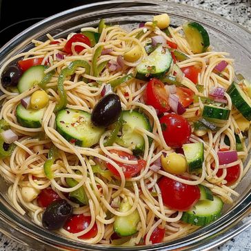 Refreshing California Spaghetti Salad: The Ultimate Summer Dish! California Spaghetti Salad Recipe, California Spaghetti Salad, California Spaghetti, Baked Cabbage Steaks, Baked Cabbage, Homemade Italian Dressing, Spaghetti Salad, Cabbage Steaks, Zesty Italian Dressing