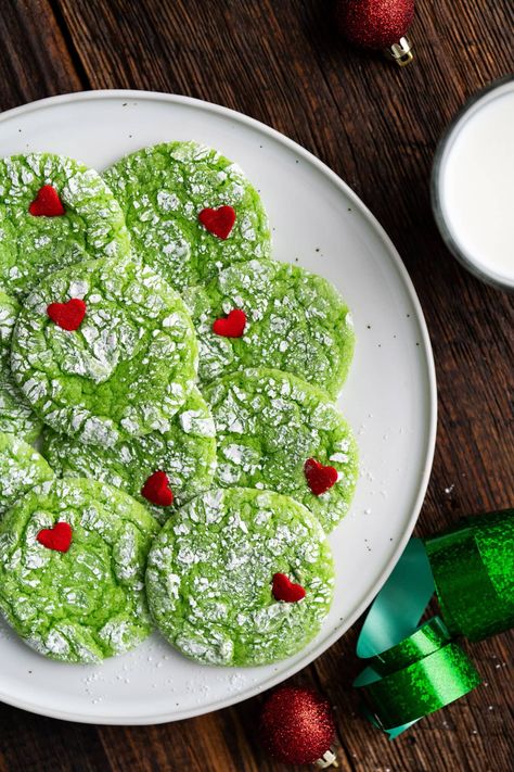 These easy grinch cookies are made with cake mix and a whole lot of love - who would have thought! A pinch of green and candy heart sprinkles brings vibrancy and life to these festive Christmas cookies. The Grinch Cake, Grinch Cookie, Green Cookies, Grinch Cake, Grinch Heart, Grinch Cookies, Random Recipes, Vanilla Cake Mixes, Cookies Cake