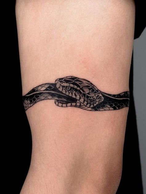 Ouroboros Tattoos: Meanings, Placement, Tattoo Designs & Ideas Snake Bracelet Tattoo, Tattoo Around Arm, Placement Tattoo, Thigh Tattoo Men, Ouroboros Tattoo, Bird Tattoo Wrist, Snake Tattoo Design, Metal Tattoo, Arm Band Tattoo