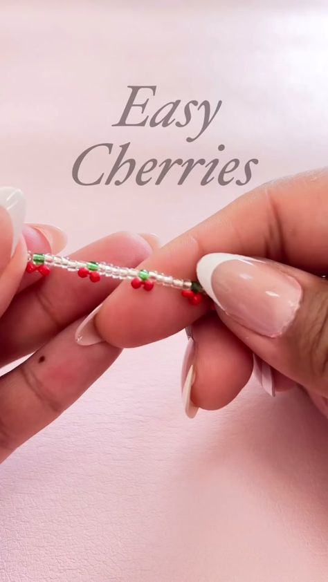 Beaded cherries tutorial🍒 @Jasmin #beads #beadedjewelry #diyjewelry #... | seed bead bracelet | TikTok Cherry Bracelet Tutorial, Cherry Seed Bead, Cherry Bracelet, Making Bracelets With Beads, Making Bracelets, Seed Bead Patterns, Seed Bead Bracelet, Michael Store, Seed Bead Bracelets