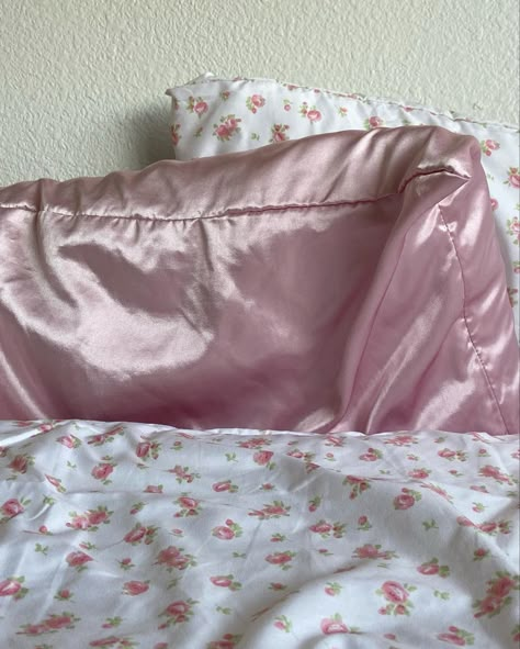 Pink Bedspread Dorm, Pink Satin Bed Sheets, Floral Bedsheets Coquette, Pink Satin Sheets Aesthetic, Satin Bedsheets Aesthetic, Pink Satin Bed Aesthetic, Pink Silk Sheets Aesthetic, Pink Satin Bedding, Cute Pillow Cases Aesthetic