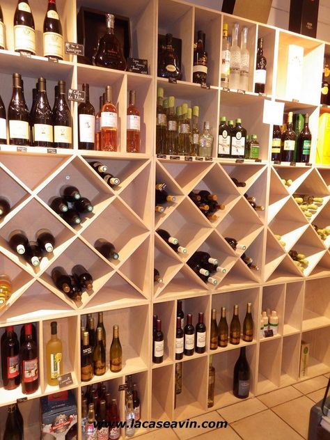 Wine Shop Interior Design Liquor Store, Bar Shelves Ideas Liquor, Wine Boutique Shops, Concealed Bar, Wine Store Design, Wine Shop Interior, Wine Bar Design, Gift Shop Interiors, Liquor Shelf