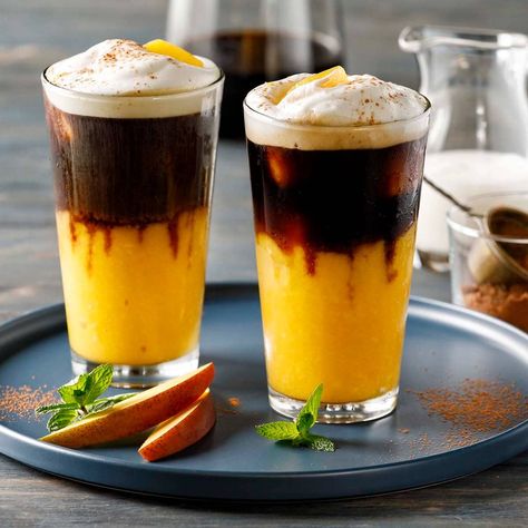 Smooth fruit flavor with a kick of caffeine and sweet cream to get you going in the morning, or any time of day. Fruity Coffee Drinks, Coffee Mocktail Recipe, Coffee Flavor Ideas, Iced Coffee Easy, Cold Coffee Drinks Recipes, Mango Coffee, Smoothie Coffee, Mango Drink, Make Iced Coffee