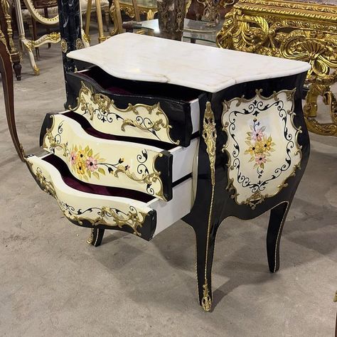 In love with this piece. Art stands out in every corner of this commode, it has 3 drawers decorated with gold handles and a beautiful black and white color. Elevate you home decor with this enchanting commode. Black And Gold Furniture, Unique Furniture Painting, Black And White Dresser, Pink Painted Furniture, Black And White Furniture, Bombay Chest, Black Painted Furniture, Painted Furniture Designs, Floral Furniture