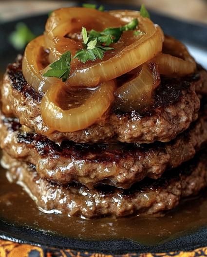 Hamburger Steaks with Onion Gravy Hamburger Steaks With Onion Gravy, Onion Gravy Recipe, Beef And Gravy, Beef Patties Recipes, Hamburger Steak And Gravy, Hamburger Steaks, Salisbury Steak Meatballs, Slow Cooker Salisbury Steak, Steak And Onions