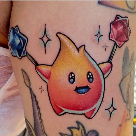 Hungry Luma tattoo from @nicolewillinghamtattoos Rad work! Who wishes Nintendo would make a Super Mario Galaxy 3?! Tag a friend who needs… Luma Mario, Super Mario Tattoo, Pokemon Sleeves, Nintendo Tattoo, Mario Tattoo, Healed Tattoo, Card Tattoo Designs, Princess Tattoo, Aesthetic Tattoos