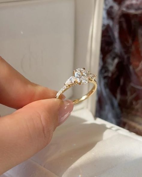 The Moissanite Company - Moissanite & Lab Diamonds on Instagram: "An oval trilogy like no other - The Florence Ring crafted with a half pavé band, pavé bridge and hidden birthstone.

Lovingly crafted in Australia for your lifetime of love. Swipe to discover this Bespoke piece from every angle.

#themoissanitecompany #labgrowndiamonds #ovaldiamond" Classic Oval Flower Ring For Wedding, Oval Flower Ring For Wedding, Delicate Flower Shaped Stackable Wedding Rings, Elegant Oval Diamond Flower Ring, Delicate Flower-shaped Stackable Wedding Rings, Flower Wedding Ring, Pave Band, Ring Crafts, Flower Wedding