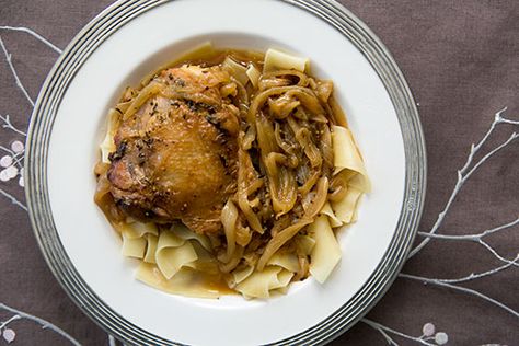 Beer Braised Chicken and Onions ~ Chicken thighs with onions, browned in butter and braised in dark beer and chicken stock, for a rich, savory stew.  Chicken carbonnade. ~ SimplyRecipes.com Chicken And Onions, Beer Braised Chicken, Stew Chicken, Beer Chicken, Peanut Stew, West African Food, Cooking With Beer, Chicken Entrees, Dark Beer