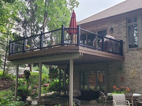 Trex Transcend Spiced Rum Decking With Trex Black Signature Aluminum Rail Highland MI Black Aluminum Railing, Trex Transcend, Trex Deck, Deck With Pergola, Aluminum Railing, Custom Decks, Spiced Rum, Deck Ideas, Roof Deck