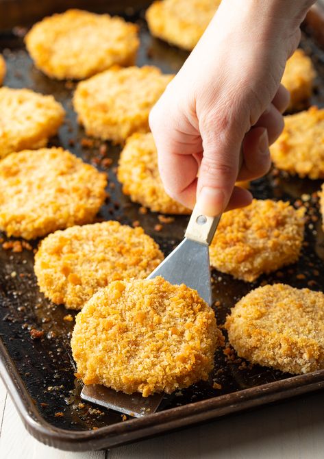 Oven Fried Green Tomatoes Recipe - Make ultra-crispy, tangy fried green tomatoes with less oil and less mess by baking in the oven! Our healthier oven baked fried green tomatoes recipe can even easily be made gluten free. #friedgreentomatoes #friedgreentomatoesrecipe #southernrecipes #ovenbaked #ovenfried #aspicyperspective Baked Green Tomatoes Recipe, Fried Green Tomatoes Oven Baked, Green Tomatoes Fried, Fried Green Tomatoes Recipe Easy Oven, Baked Green Tomatoes Oven, Vegan Fried Green Tomatoes Recipe, Fried Tomatillo Recipes, Baked Fried Green Tomatoes Recipe, Oven Fried Green Tomatoes Recipe