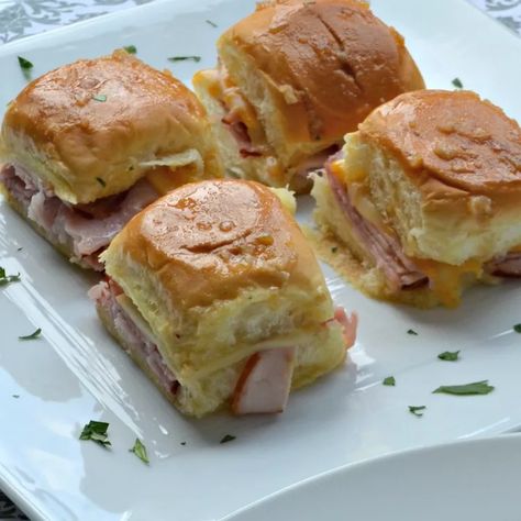 30 Party Appetizer Recipes Your Guests Will Love Ham And Cheese Party Sandwiches, Party Food Sandwiches, Ideas For Party Food, Party Sandwiches Recipes, Baked Ham And Cheese Sliders, Ham Rolls, Party Bread, Food Sandwiches, Sweet Dinner Rolls