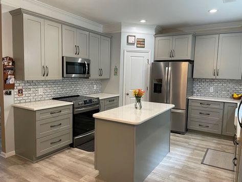 Cabinets were done in the Catalina shaker door in a beautiful pebble grey color. Kraftmaid Pebble Gray Cabinets, Pebble Grey Kitchen Cabinets, Pebble Grey Kitchen, Foxtail Palm, Reno Kitchen, Kitchen 2022, Light Gray Cabinets, Pebble Grey, Grey Kitchen Cabinets