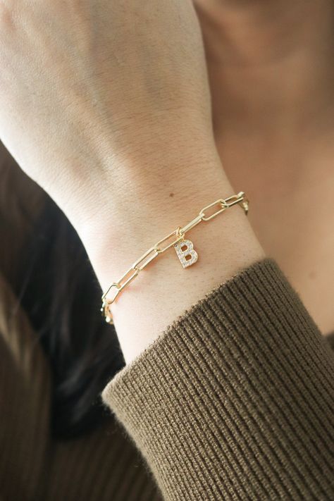 Beautiful bracelet with Initials. This bracelet, your wrist will seriously love! This pearl bracelet is so simple, but super elegant. Makes a great gift! Perfect on it's own or stacked with more bracelets! ----------------------♡--------------------- M A T E R I A L S: * Chain :18K Gold Plated over Brass * Cubic Zirconia -----------------------♡-------------------- SIZE * Chain length: adjustable from 6 to 8 INCHES -----------------------♡-------------------- H O W T O O R D E R 1.) Choose the O Bracelet With Letters Gold, Bracelet With Initials, Alphabet Bracelet, Initial Bracelets, Cotton Cord Bracelet, Gold Bracelet Simple, Gold Bracelets Stacked, Elegant Jacket, Antique Jewellery Designs