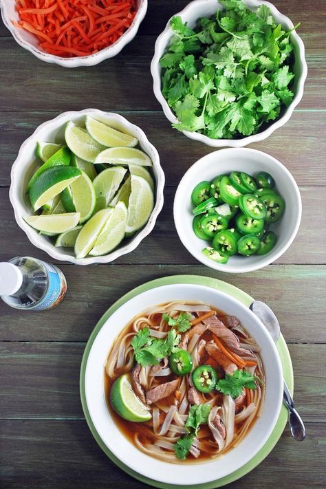 Make your own DIY beef pho bowls with a simple and delicious flank steak pho recipe!  Tender flank steak is the star of this nutritious one-dish meal. Easy Beef Pho, Best Pho Recipe, Pho At Home, Tender Flank Steak, Tasty Beef Stew, Bar Tender, Beef Flank Steak, Pho Recipe, Flank Steak Recipes