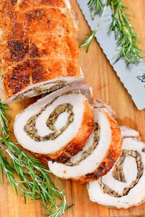 Stuffed Pork Loin is a juicy, flavorful, and thoroughly impressive main course. It might look intimidating, but don't fret, it's really quite simple! This tasty entrée is made with pork loin and stuffed with a mixture of mushrooms, shallots, garlic, and Gruyere cheese. Don't forget to save the drippings from roasting the pork loin so you can make a delicious gravy! Pork Loin Filet Recipes, Drumstick Recipes Baked, Pork Loin Filet, Boneless Pork Loin Recipes, Pork Roast And Sauerkraut, Filet Recipes, Stuffed Pork Loin, Slow Cooker Pork Loin, Meat Entrees