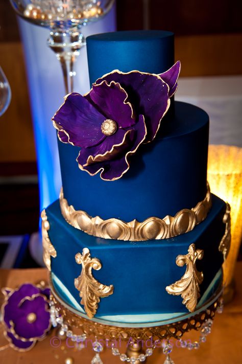 Royal blue, gold, purple cake Purple Blue Gold Party Decorations, Blue Gold And Purple Wedding, Royal Blue And Purple Wedding Cake, Royal Blue Purple And Gold Wedding, Royal Blue And Gold Cake For Men, Royal Purple Wedding Decorations, Purple Blue Gold Wedding, Purple And Blue Quinceanera Ideas, Royal Blue And Purple Wedding Theme