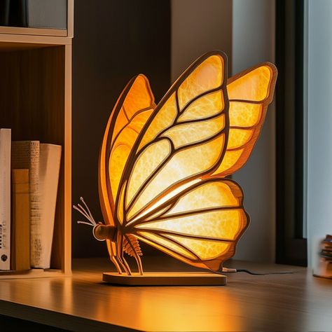 Say hello to the Monarch Butterfly lamp, a staple for any household. If you want to connect with the serenity of nature from the comfort of your home, here’s your chance! This lamp not only focusses in design and style, but also spotlights conservation and forestry. It’s never been easier to become a butterfly mom while also staying indoors - get yours now 🩵 Butterfly Light, Led Butterfly, Butterfly Lamp, Butterfly Resin Lamp, Wooden Lamps Design, Buttterfly Lamp, Stained Glass Butterfly Lamps, Butterfly Project, Butterfly Lighting