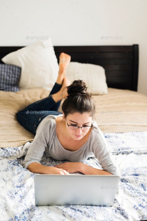 Beautiful young woman lying on bed, working. Home office. by halfpoint. Beautiful young woman lying on bed, working on notebook, home office.#lying, #bed, #woman, #Beautiful Head On Table Pose, Woman Shopping, Blond Woman, Pregnancy Information, Digital Tablet, Working Mother, Online Shopping For Women, Happy Women, How To Make Bed