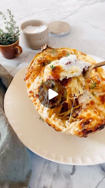 Tieghan Gerard on Instagram: "Roasted Garlic Spaghetti Squash Lasagna Boats. The lasagana I always make in the winter. These boat swill be perfect for Valentine’s Day this week. Super cute and so delicious 💕

1 tablespoon extra virgin olive oil, plus more for drizzling
1 head garlic
3/4 pound ground spicy Italian chicken sausage or ground chicken
1 small yellow onion, chopped
1 can (28 ounce) crushed San Marzano tomatoes
1 dried bay leaf
2 teaspoons dried oregano
2 medium spaghetti squash, halved and seeds removed
1/2 cup whole milk or heavy cream
1/4 cup whole milk ricotta cheese
1/2 cup fresh basil, chopped
1/8 teaspoon grated fresh nutmeg
1 1/2 cups shredded fontina cheese or mozzarella cheese
1 cup shredded provolone cheese

https://www.halfbakedharvest.com/roasted-garlic-spaghetti-sq Roasted Garlic Spaghetti Squash, Roasted Garlic Spaghetti, Spaghetti Squash Lasagna Boats, Garlic Spaghetti Squash, Lasagna Boats, Bowls Healthy, Tieghan Gerard, Spaghetti Squash Lasagna, Squash Lasagna