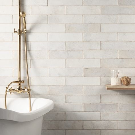 Modern meets rustic with the Vandalay Collection, offering a unique reinvention of the hexagon and subway tiles. With worn edges and a uniquely textured surface featuring a reflective chameleon ink, this series redefines vintage with contemporary colors and a depth of design. Artmore Tile Vandalay 22-Pack White 3-in x 12-in Polished Ceramic Subway Wall Tile | EXT3RD107690 Artmore Tile, Glossy Ceramic Tile, Cream Tile, Subway Tile Showers, Subway Tiles Bathroom, Shower Wall Tile, Kalay, Polish Ceramics, Polished Porcelain Tiles