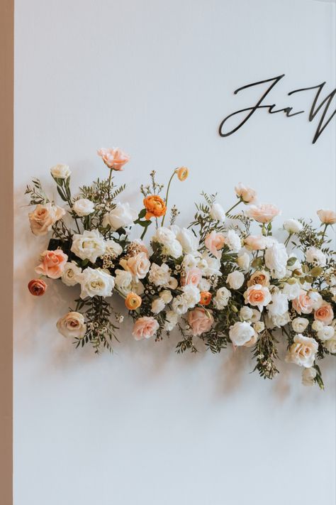 Check out this flower backdrop idea made of peach and white themed roses. Peach And Pink Wedding Backdrop, Pink Peach Cream Wedding, Peach Theme Wedding Decor, Peach And White Flower Arrangements, White And Peach Wedding Decor, Peaches And Cream Wedding Theme, Wedding Alter Flowers, Peach Backdrop, Backdrop Lamaran