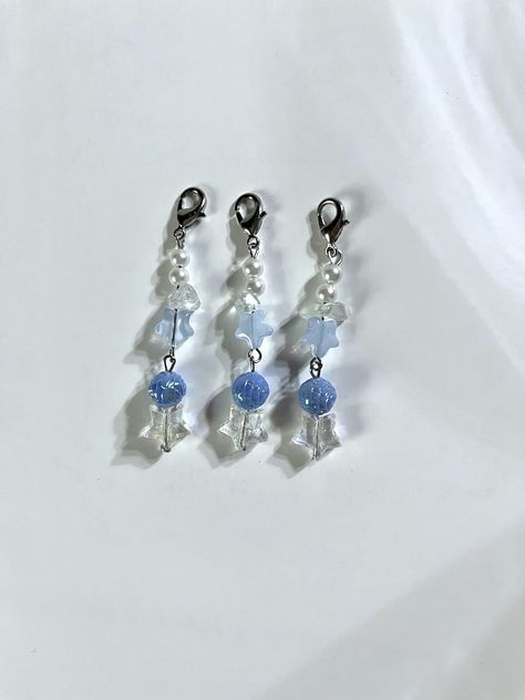 There are only 10 of these keychains and I don't plan on restocking them so if you've been eyeing them get it now!!  Please keep in mind that I am a human being and that not all of these keychains are the same as they are handmade. These lovely light blue, white, and clear keychains are handmade and are super easy to attach! The beads are from various sources and they all work in harmony to make this keychain look beautiful. Listing is for one keychain Blue Keychains, White Keychain, Blue Keychain, Blue Angels, White Star, Diy Keychain, Beaded Keychains, Human Being, Diy Accessories