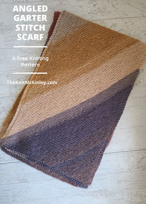 If you're ready to level up your garter stitch, check out this pattern for a free Angled Garter Stitch scarf. Using make one (M1) increases and SSK (slip, slip, knit) decreases, you can knit a a self-striping scarf on an angle. A really pretty but simple knitting pattern. Plus every row is knit (the main pattern is garter stitch!). Garter Stitch Shawl Free Pattern, Scarfie Yarn, Garter Stitch Scarf, Knitting Space, Simple Knitting, Garter Stitch Knitting, Scarf Knitting Pattern, Cowl Knitting, Shawl Knitting