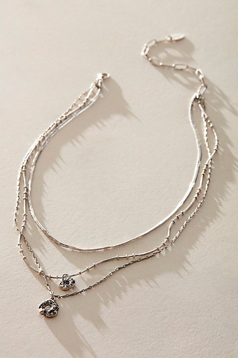 Add the perfect touch of effortless edge to absolutely every look with this so cool necklace featured in a layered, textured, chain silhouette with tiered pendant at bottom for dimension. | Effortless Layered Necklace by Free People in Silver Layering Sterling Silver Necklaces, Cheap Chic Silver Layered Necklace, Silver Stacked Necklaces, Silver Multi-strand Dainty Layered Necklace, Silver Necklaces Layered, Silver Layered Necklaces, Silver Necklace Stack, Silver Minimalist Multi-strand Layered Necklace, Everyday Necklace Silver