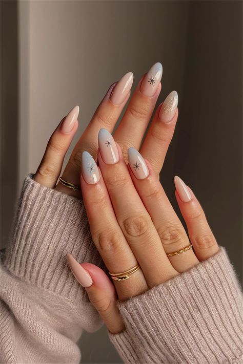 Embrace the magic of the season with this stunning winter-inspired nail design. Picture soft, pale blue nails adorned with delicate snowflakes and glistening silver accents, capturing the essence of a winter wonderland. These simple nail ideas are perfect for adding a touch of elegance to your chilly days. Whether you're sipping hot cocoa or attending festive gatherings, these chic nails will keep you stylish all winter long! Pale Nails Designs, Light Winter Nails, Pale Blue Nails, Simple Nail Ideas, Pale Nails, Design Picture, Winter Inspired, Simple Nail, Cozy Chic