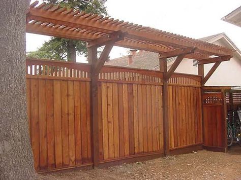 Fence with trellis across the back of the backyard. Would be so cool - just so expensive. Trellace Fence Privacy Screens, Closing Up An Exterior Doorway, Fence With Pergola Top, Fence With Trellis Top, Pergola Fence, Fence Pergola, Wisteria Trellis, Fence Trellis, Wisteria Pergola