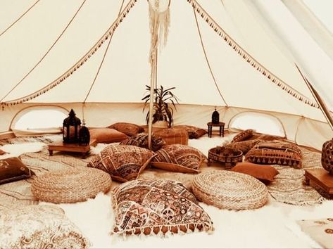 Forgoing the sleeping bags and rickety tents of traditional camping, glamping is a much more luxurious way to enjoy the great outdoors in style. #interior #interiordesign #interiordecor #interiordecoration #decor #decoration #design #bathroom #bathroomdesign #bathroomdecor #kitchen #kitchendecor #kitchendesign #homedecor #homedecoration #exterior #exteriordesign Boho Glamping Tent, Boho Bell Tent, Boho Tent Decor, Glamping Bell Tent, Boho Tent Party, Bell Tent Wedding, Bell Tent Decor, Bell Tent Party, Glamping Tent Decor