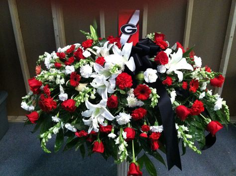 Georgia bulldog themed casket cover. A beautiful arrangement of red and white flowers. Accented with black. White Casket Spray, White Casket, Flowers Step By Step, Casket Spray, Casket Flowers, Casket Sprays, Water Ski, Grave Decorations, Diy Arrangements