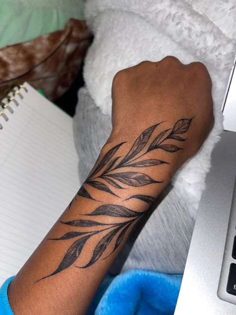 Leaves Wrist Wrap Tattoo, Hand Wrap Around Tattoo, Wrap Around Tattoo Ideas Female, Plant Tattoo Black Women, Wrap Around Tattoo Black Women, Henna Wrap Around Tattoo, Leaves Sleeve Tattoos For Women, Leaf Around Wrist Tattoo, Leaf Ankle Tattoo Wrap