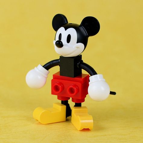 Mickey Mouse | LEGO Mickey Mouse How to build↓ www.youtube.c… | Flickr Lego Mickey Mouse, Ninjago Minifigures, Lego Ninjago Minifigures, Mickey Mouse Tattoo, Sorcerer Mickey, Mickey Mouse Design, Lego Custom Minifigures, Lego Activities, Lego Robot