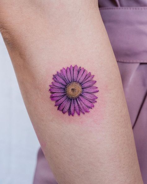 Gerbera Daisy Tattoo, Gengar Tattoo, Purple Flower Tattoos, Hunter Tattoo, Purple Tattoos, Lavender Tattoo, April Birth Flower, Neck Tattoos Women, Ribbon Tattoos