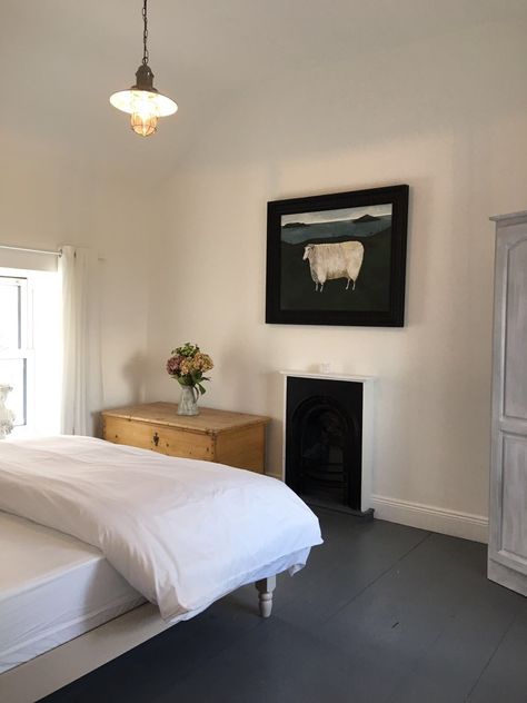 dark painted floor and stove inset Dark Painted Floors, Black Painted Floorboards, Painted Floor Bedroom, Black Painted Floors, Traditional Irish Cottage Interiors, Dark Floor Bedroom, Traditional Irish Cottage, Irish Cottage Interiors, Sunroom Makeover