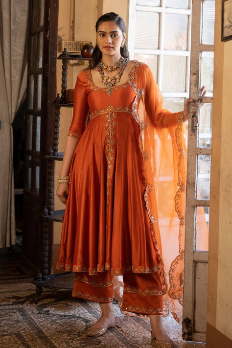 Orange embroidered Anarkali and pant set for women Elegant Anarkali Suits, Tissue Anarkali Dress, Embroidery On Orange Fabric, Tissue Fabric Dress Design, Silk Dresses Indian, Rust Orange Lehenga, Mehndi Gharara, Wedding Guests Outfits, Elia Martell