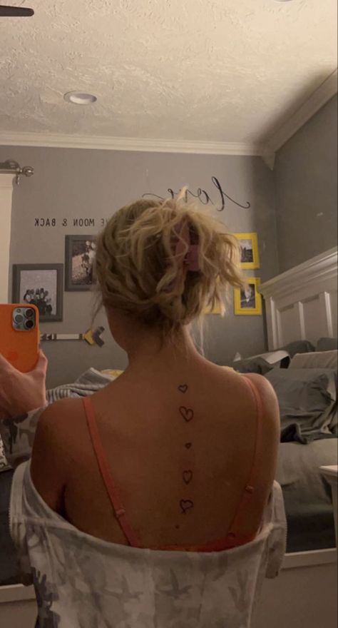 Heart Tattoo On Spine, Hearts Down Spine Tattoo, Heart Tattoo Spine, Heart Back Tattoo Women, Spine Heart Tattoo, Heart Spine Tattoo, Heart Tattoo On Back, Heart Tattoo Placement Ideas, Heart Tattoo Back