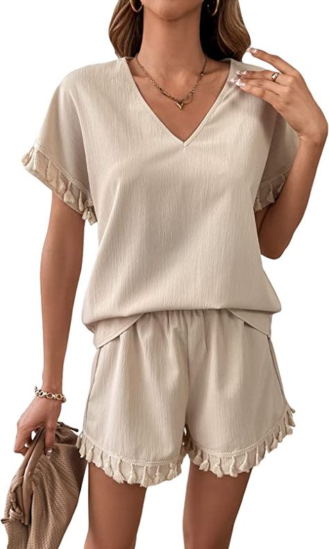 Feature: short sleeve, v neck, blouse top, elastic waist shorts, tassel trim, casual style Occasions: summer daily wear, fit for holiday, vacation, beach, leisure, home, travelling, etc Regular fit, tassel shorts set, 2 piece shorts set for women, two piece summer outfits for women Please refer to the Product Measurement in the last image (The Product Measurement is clothes size, NOT human body size) Home Clothes Women Summer, Short Sets For Women Two Pieces, Home Clothes Women, Tassel Outfit, Fringe Shorts, Tassel Shorts, Batwing Sleeve Blouse, Elastic Waist Shorts, Tracksuit Women