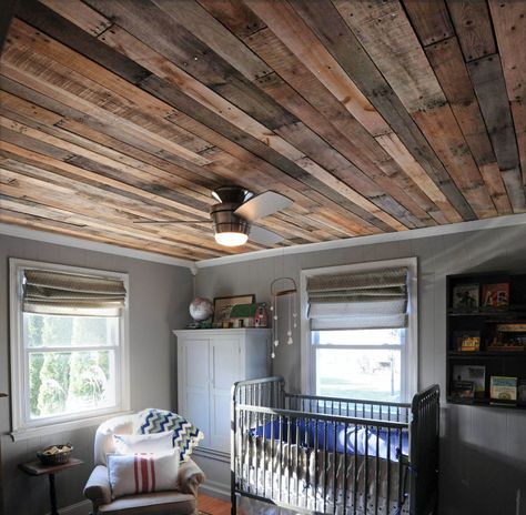 A DIY blogger transforms her son's bedroom ceiling with pallets and shares other projects she and her husband have tackled. Ceiling Ideas For Bedroom, Diy Ceiling Ideas, Decorating Basement, Basement Unfinished, Pallet Wall Ideas, Pallet Ceiling, Basement Lighting, Pallet Furniture Designs, Basement Decorating