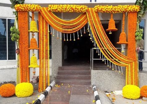 Marigold Entrance by Priti Nagpal. #housewarmingceremony #housewarming #houseparty #housedecor #homedecor #entrancedecor #homeentrancedecor #houseceremony #entrance #floralentrance #traditionalentrance #entrancedecor #marigoldentrance #marigolddecor House Decoration For Wedding Indian, Marigold Wedding Decoration, Marigold Flower Garland, Gate Decoration, Wedding Hall Decorations, Diwali Decorations At Home, Wedding Background Decoration, Housewarming Decorations, Wedding Entrance Decor