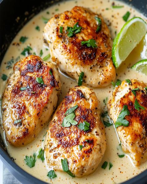 Learn how to make this easy Coconut Milk Chicken Breasts recipe in one pan. Tender chicken in a creamy coconut sauce in just 40 minutes. Chicken Thigh Coconut Milk, Thai Chicken Recipes Coconut Milk, Coconut Sauce Chicken, Coconut Cream Chicken Recipes, Coconut Milk Dinner Recipes, Dairy Free Chicken Breast Recipes, Chicken Breast Recipes Dairy Free, Coconut Chicken Rice, Coconut Cream Chicken